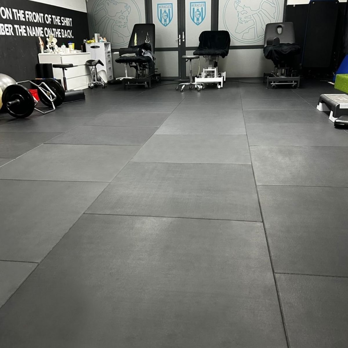 Interlocking rubber gym tiles installed in gym